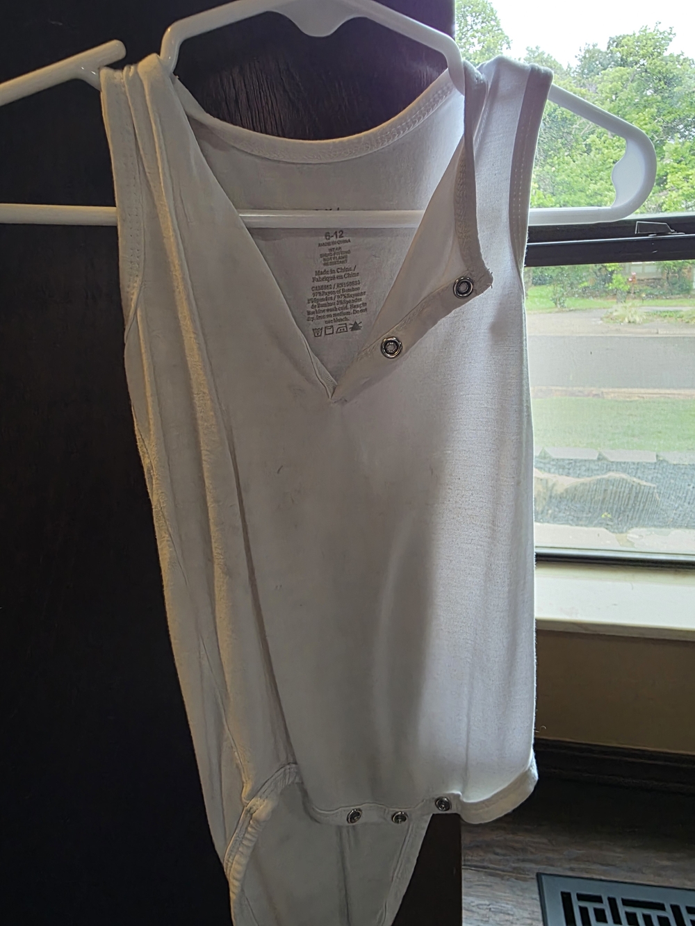 Kyte BABY White Sleeveless Snap-Front Baby Bodysuit